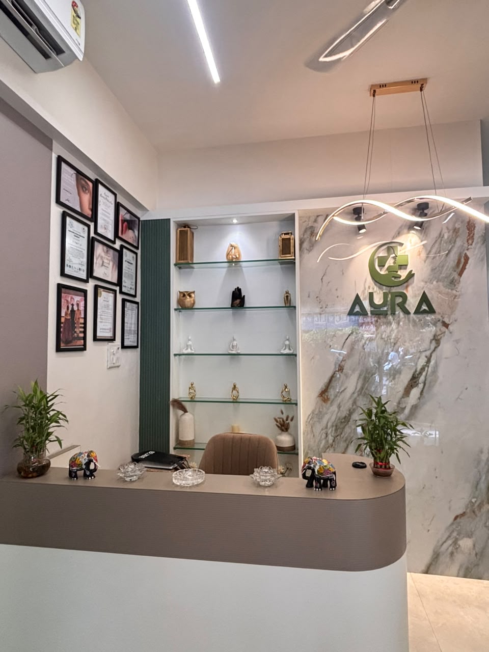 Aura Clinic reception area with modern interior design